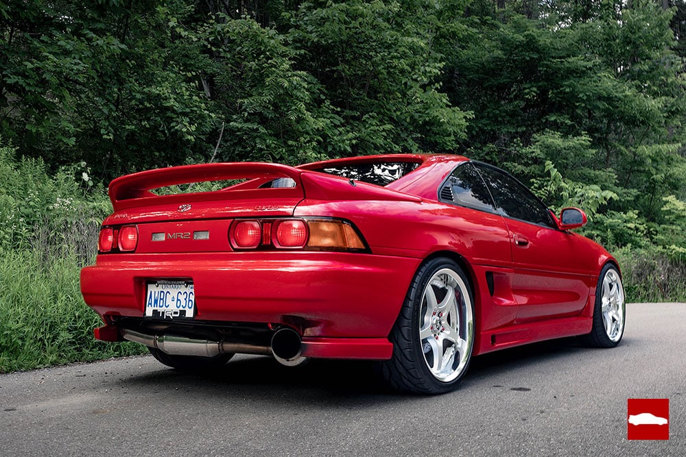 Red sw20 mr2 parked near trees