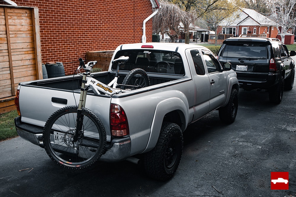 Toyota Tacoma with mountain bike in back