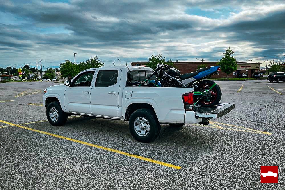 3rd gen Tacoma with motorcycle in bed