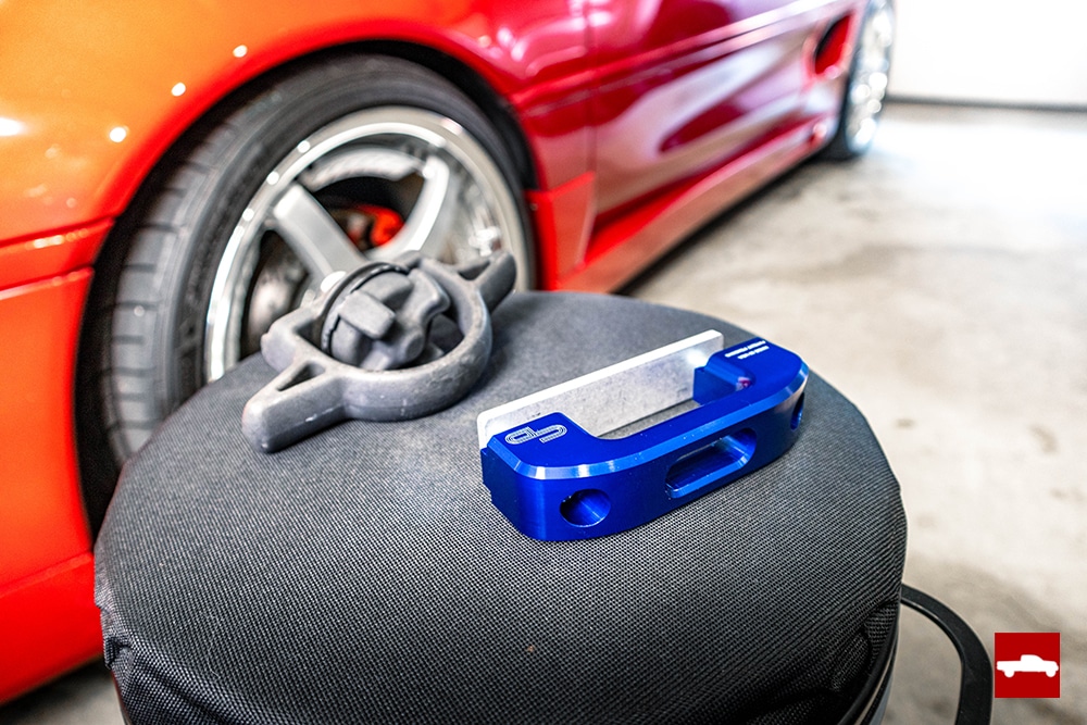 Charvonia Design billet tie down with OEM Tacoma tie down