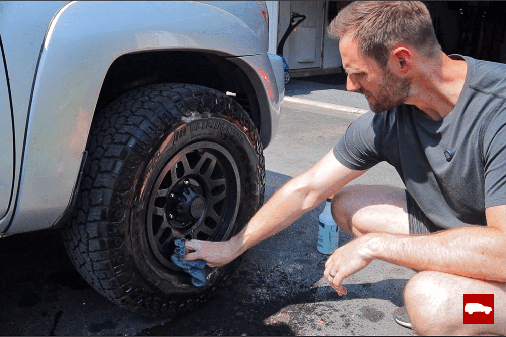 Wiping a wheel with rinseless wash